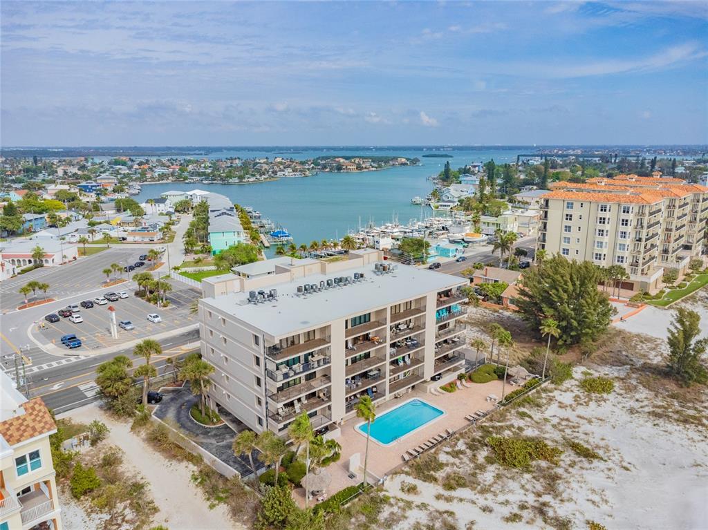 13650 Gulf Boulevard, Unit 402 Madeira Beach, FL 33708 - Photo 41 of 44 a view of a city with an ocean view