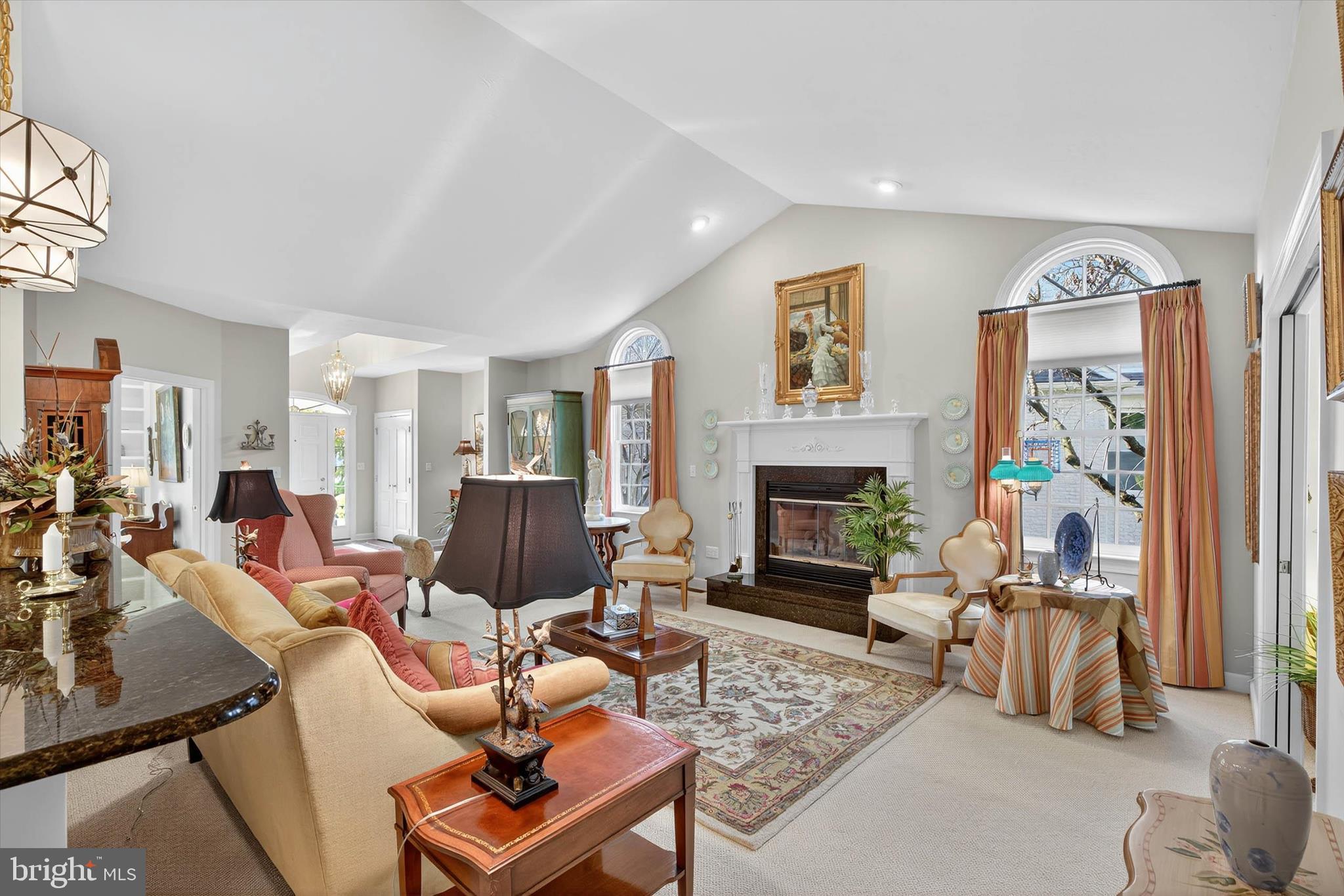 1029 Stonecroft Drive Hanover, PA 17331 - Photo 15 of 72 a living room with furniture a fireplace and a flat screen tv