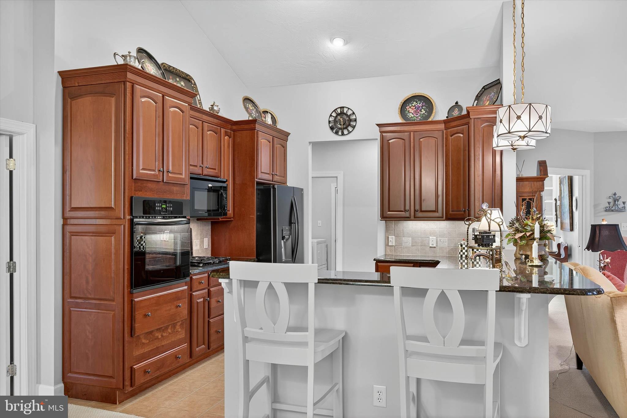 1029 Stonecroft Drive Hanover, PA 17331 - Photo 19 of 72 a kitchen with stainless steel appliances granite countertop a refrigerator and a stove top oven