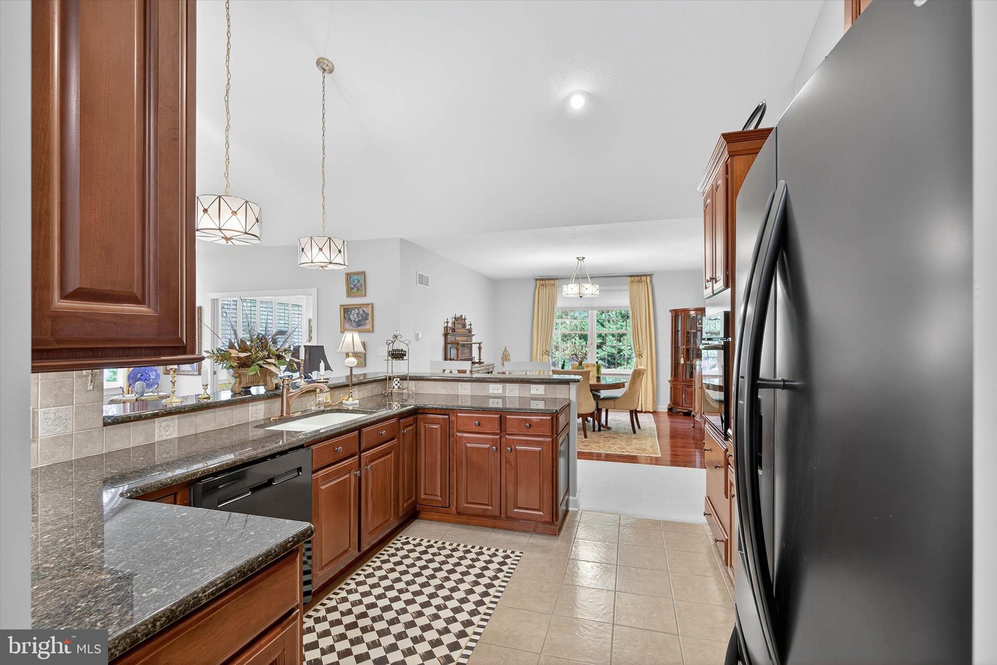 1029 Stonecroft Drive Hanover, PA 17331 - Photo 24 of 72 a kitchen with stainless steel appliances granite countertop a sink stove and refrigerator