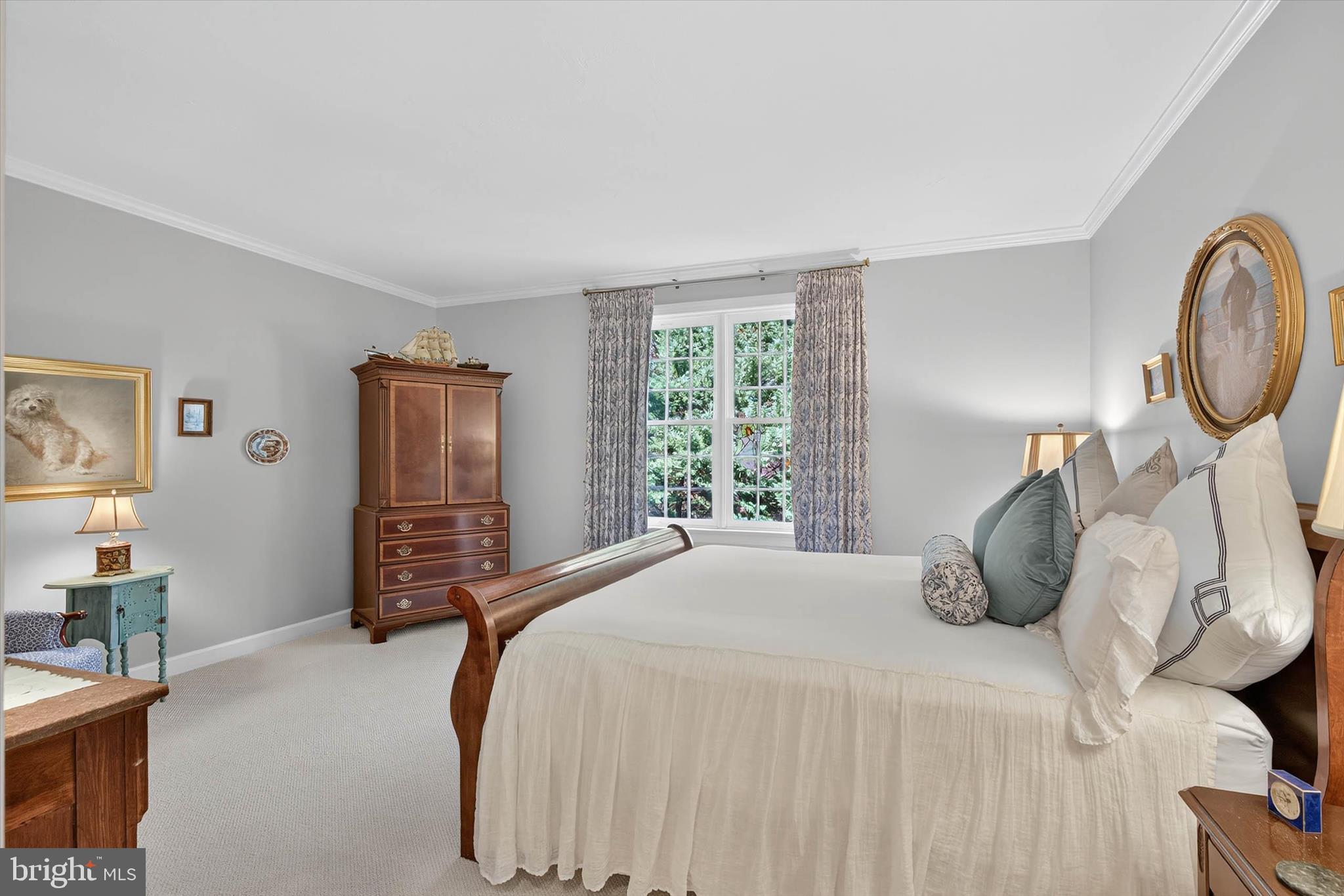 1029 Stonecroft Drive Hanover, PA 17331 - Photo 34 of 72 a bedroom with a bed and a chandelier