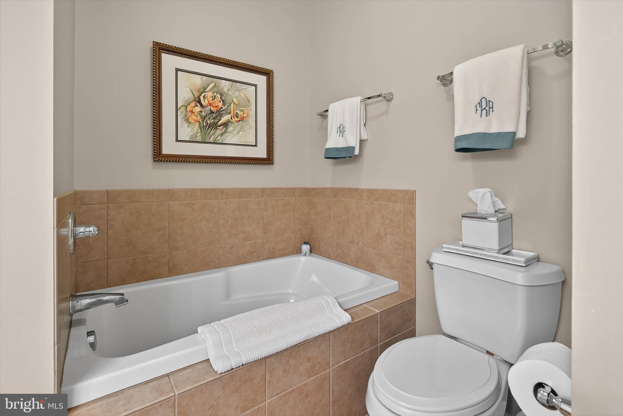 1029 Stonecroft Drive Hanover, PA 17331 - Photo 39 of 72 a white toilet sitting next to a bathroom sink and tub