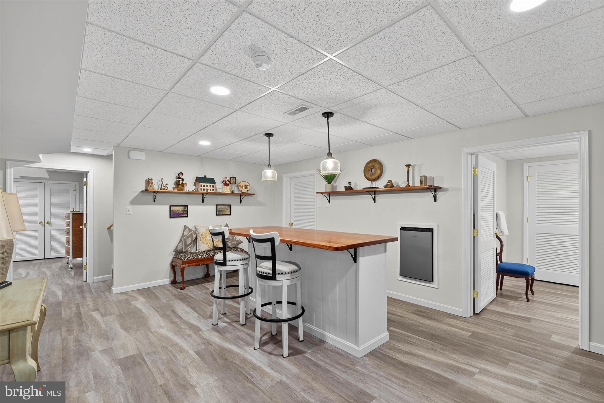 1029 Stonecroft Drive Hanover, PA 17331 - Photo 49 of 72 a kitchen with stainless steel appliances granite countertop a table chairs refrigerator and sink