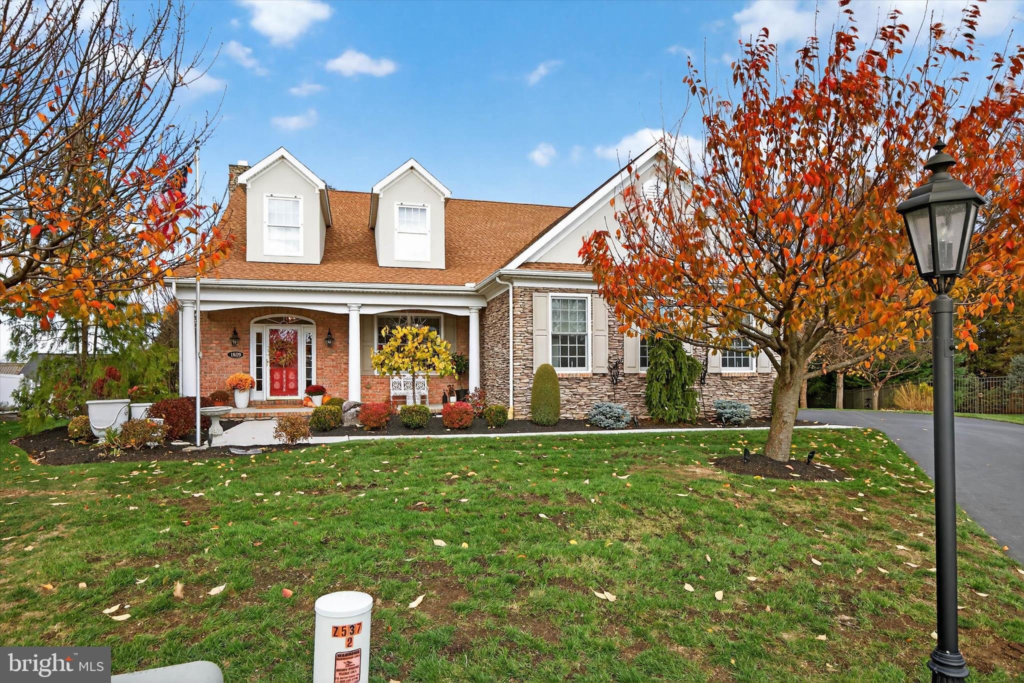 1029 Stonecroft Drive Hanover, PA 17331 - Photo 9 of 72 a front view of house with yard outdoor seating and green space