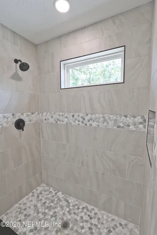 a view of a walk in closet