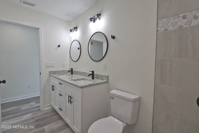 a view of a yard with a house and tree s