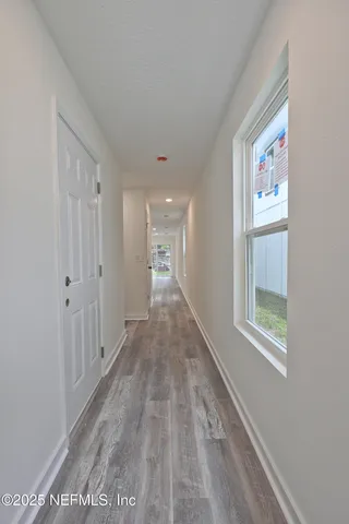 a kitchen with stainless steel appliances granite countertop a sink a stove and a granite counter tops