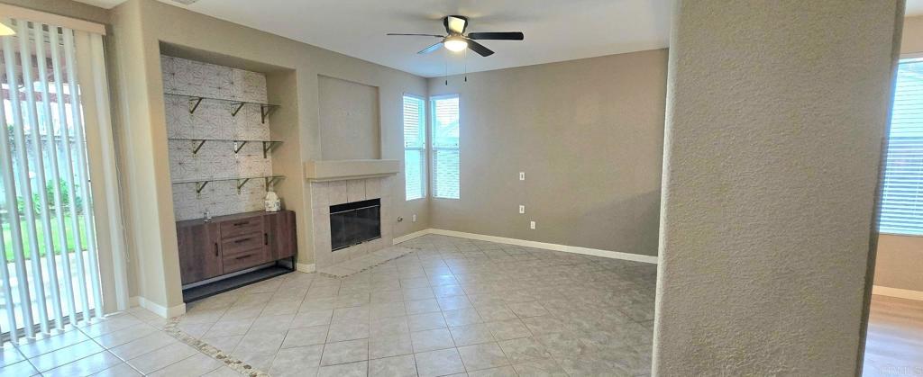 5071 Avocado Park Way Fallbrook, CA 92028 - Photo 4 of 7 a view of a kitchen with a sink and a fireplace
