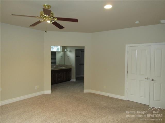 824 Ribbon Falls Road Redmond, OR 97756 - Photo 10 of 19 Master suite is spacious and has a ceili