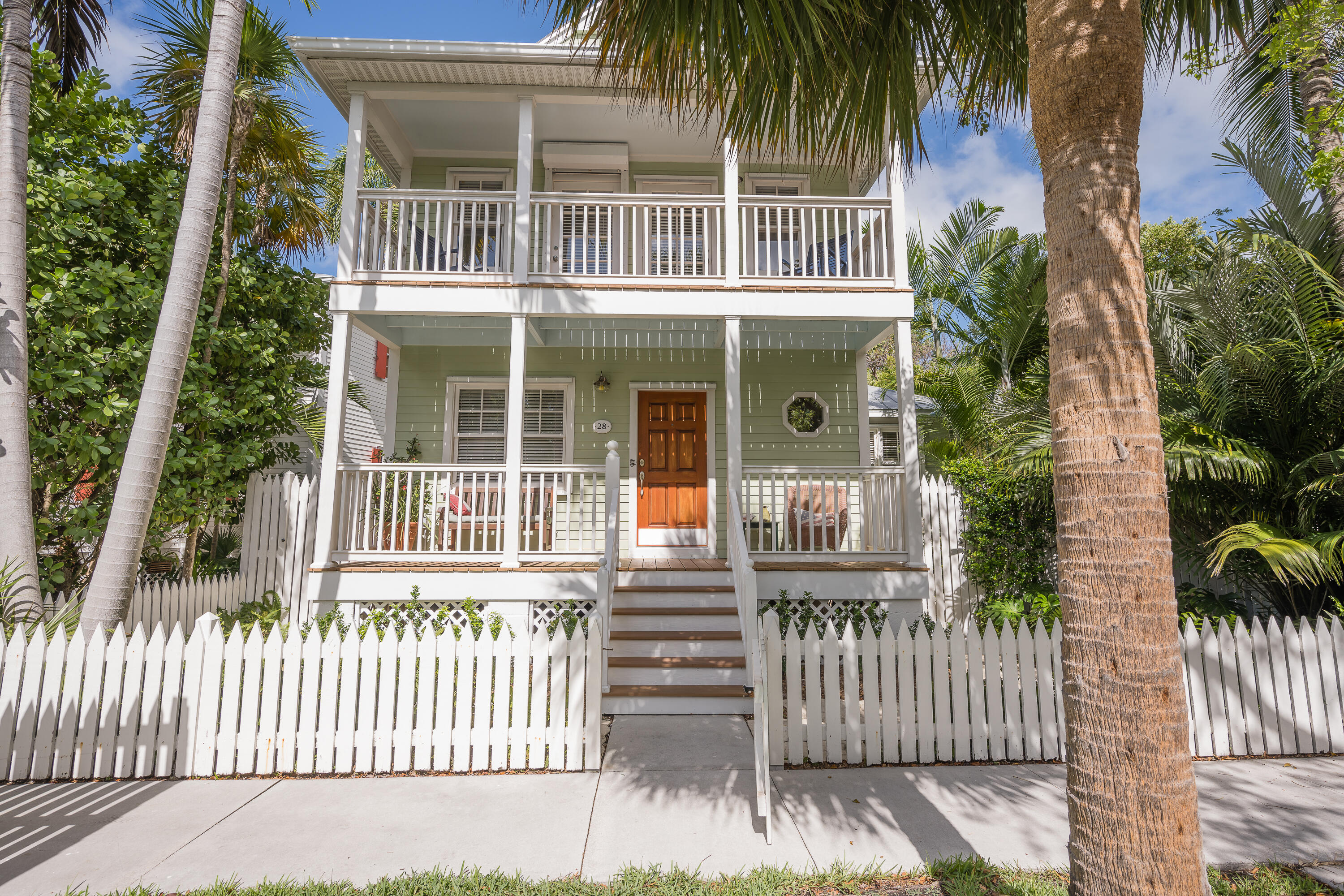 28 Spoonbill Way Key West, FL 33040 - Photo 1 of 82 a front view of a house with a porch