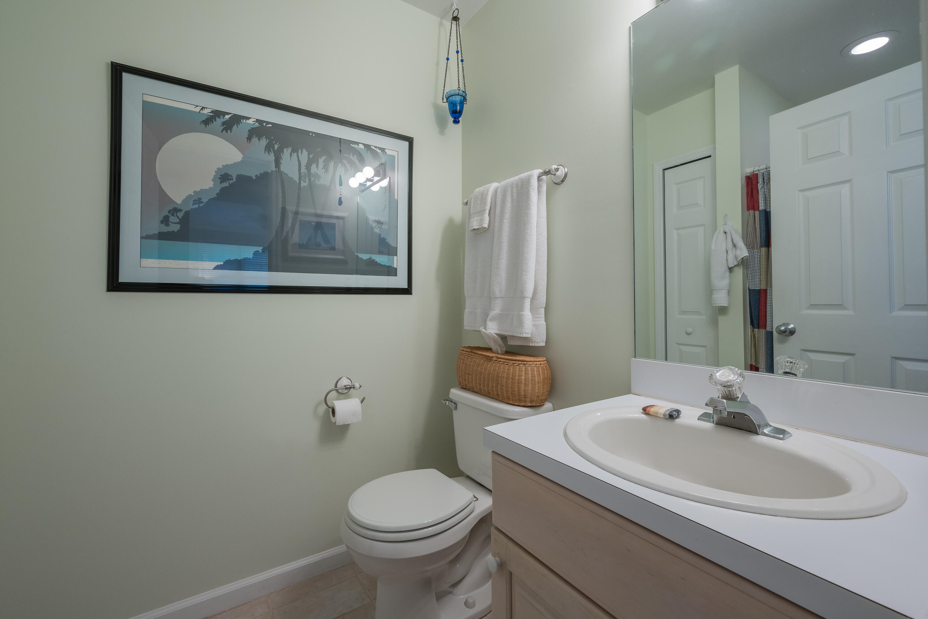 28 Spoonbill Way Key West, FL 33040 - Photo 17 of 82 a bathroom with a toilet sink and mirror
