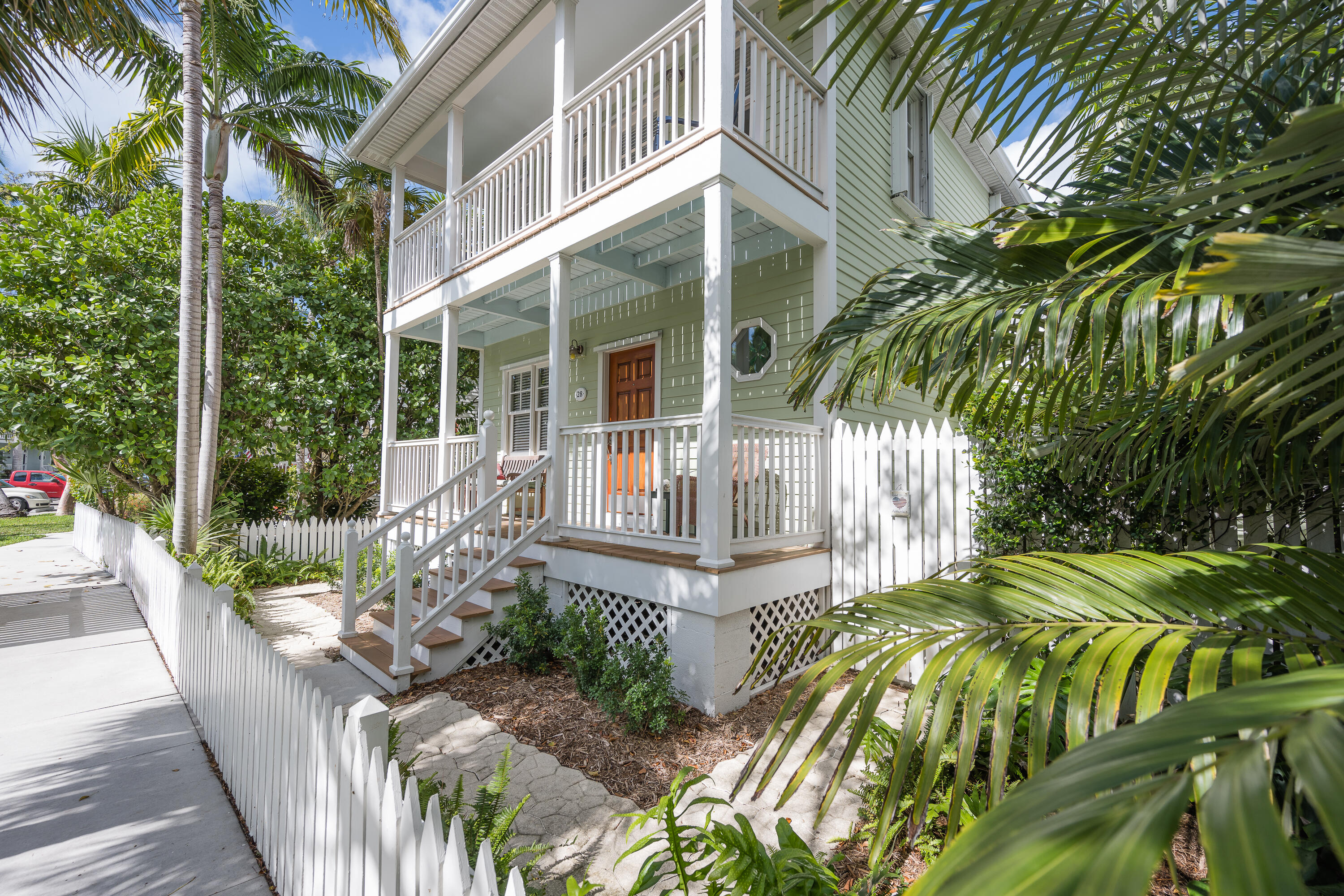 28 Spoonbill Way Key West, FL 33040 - Photo 2 of 82 a front view of a house with a yard