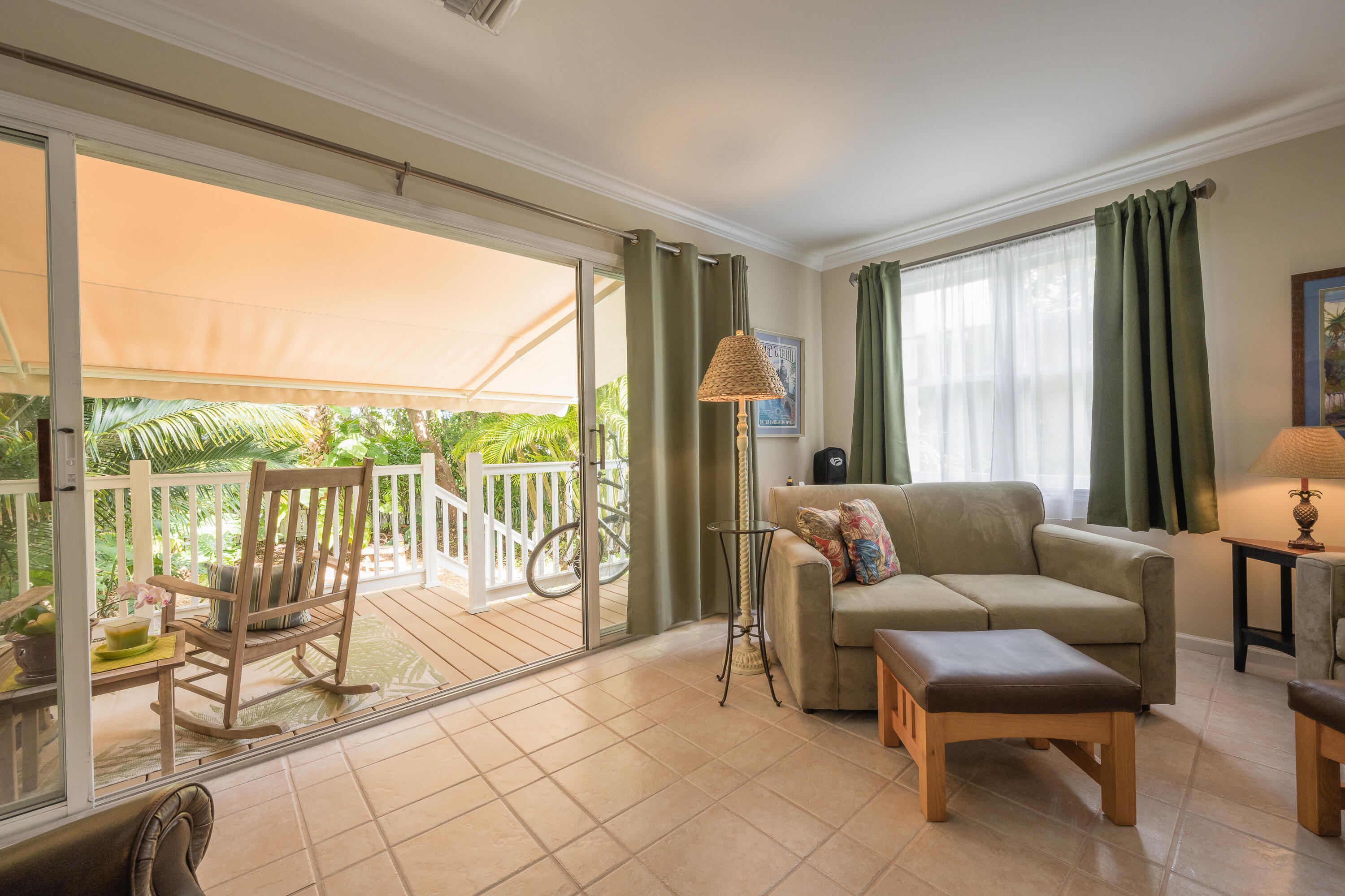 28 Spoonbill Way Key West, FL 33040 - Photo 24 of 82 a living room with furniture and a floor to ceiling window