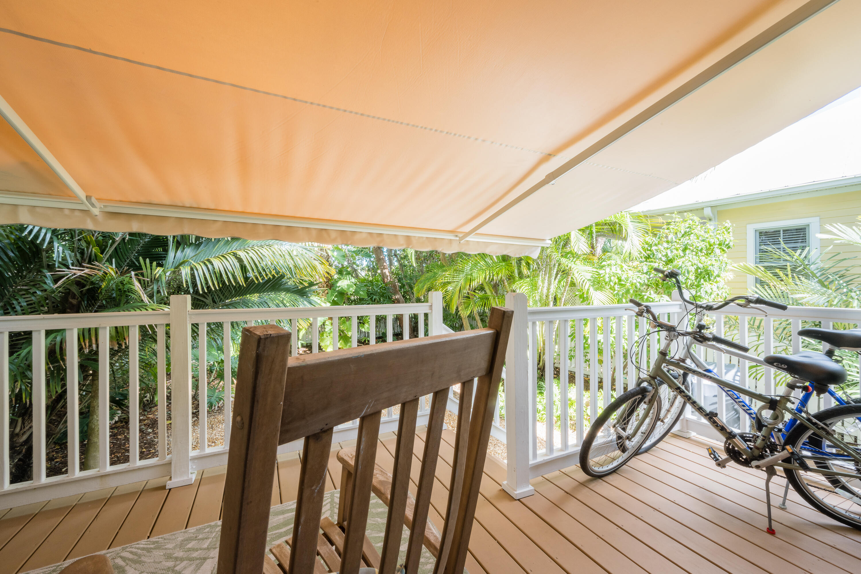 28 Spoonbill Way Key West, FL 33040 - Photo 26 of 82 a view of balcony with wooden floor and fence