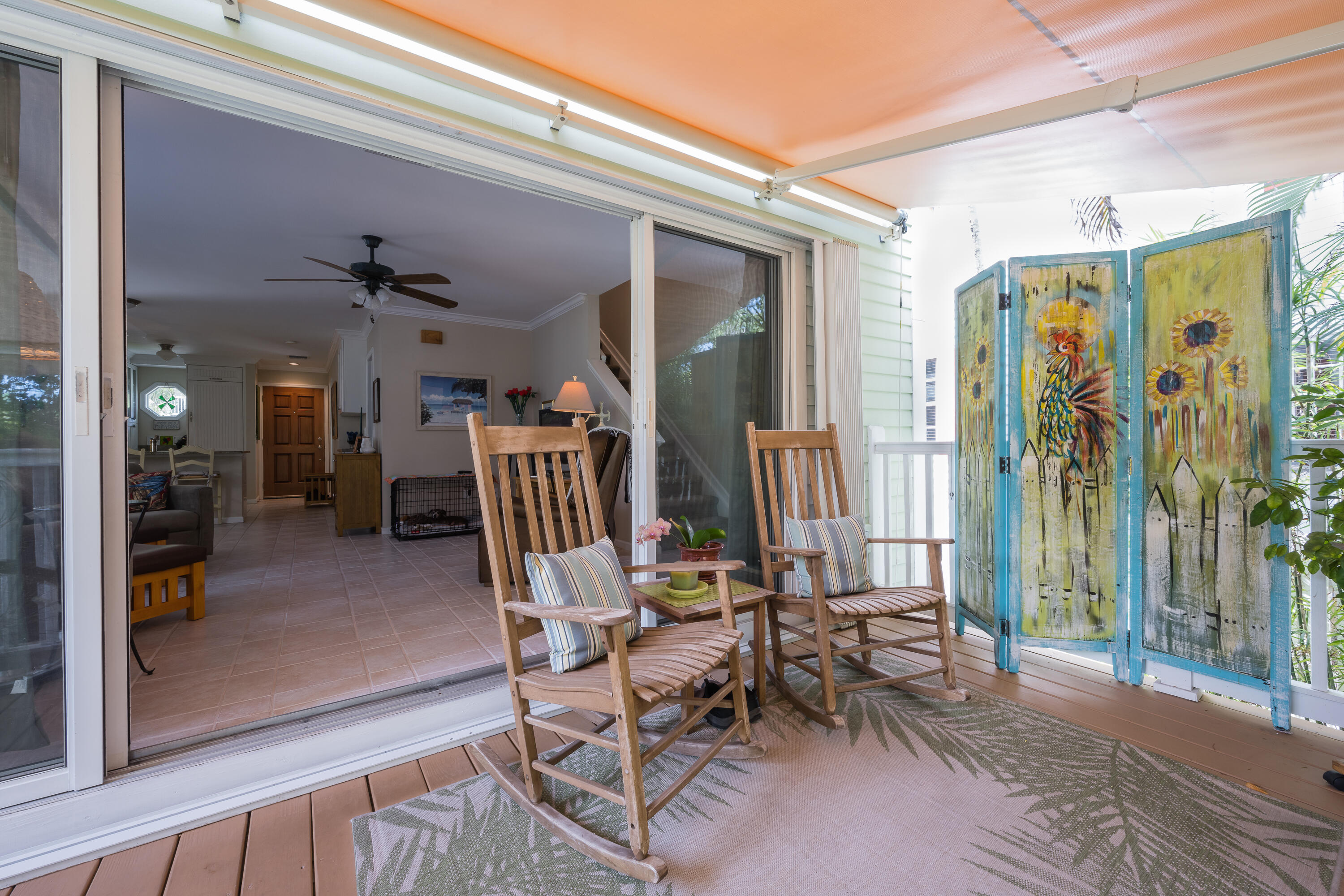28 Spoonbill Way Key West, FL 33040 - Photo 29 of 82 a view of a porch with chairs and entryway