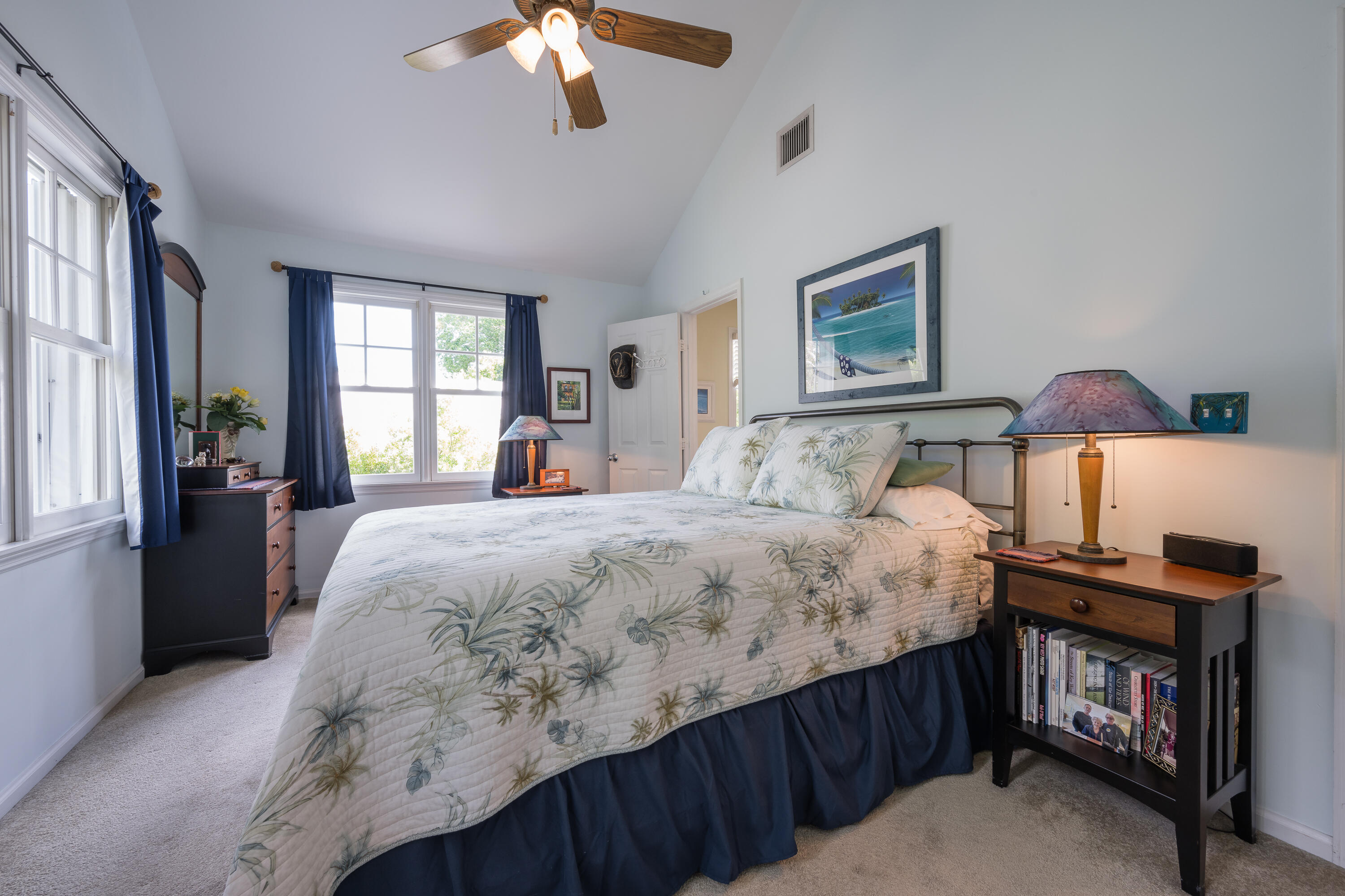 28 Spoonbill Way Key West, FL 33040 - Photo 34 of 82 a bedroom with a bed and a chandelier