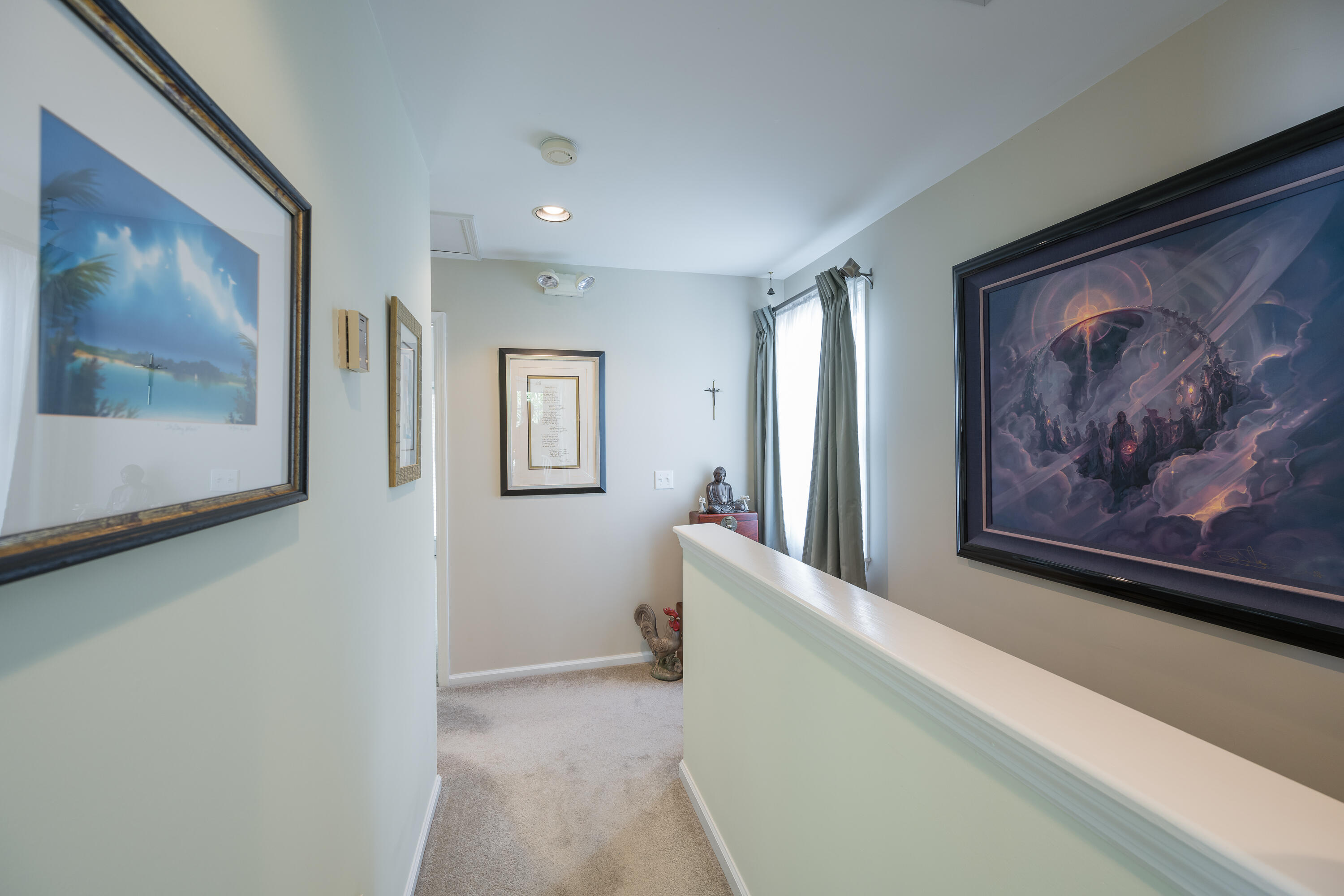 28 Spoonbill Way Key West, FL 33040 - Photo 39 of 82 a view of a hallway with a painting on the wall