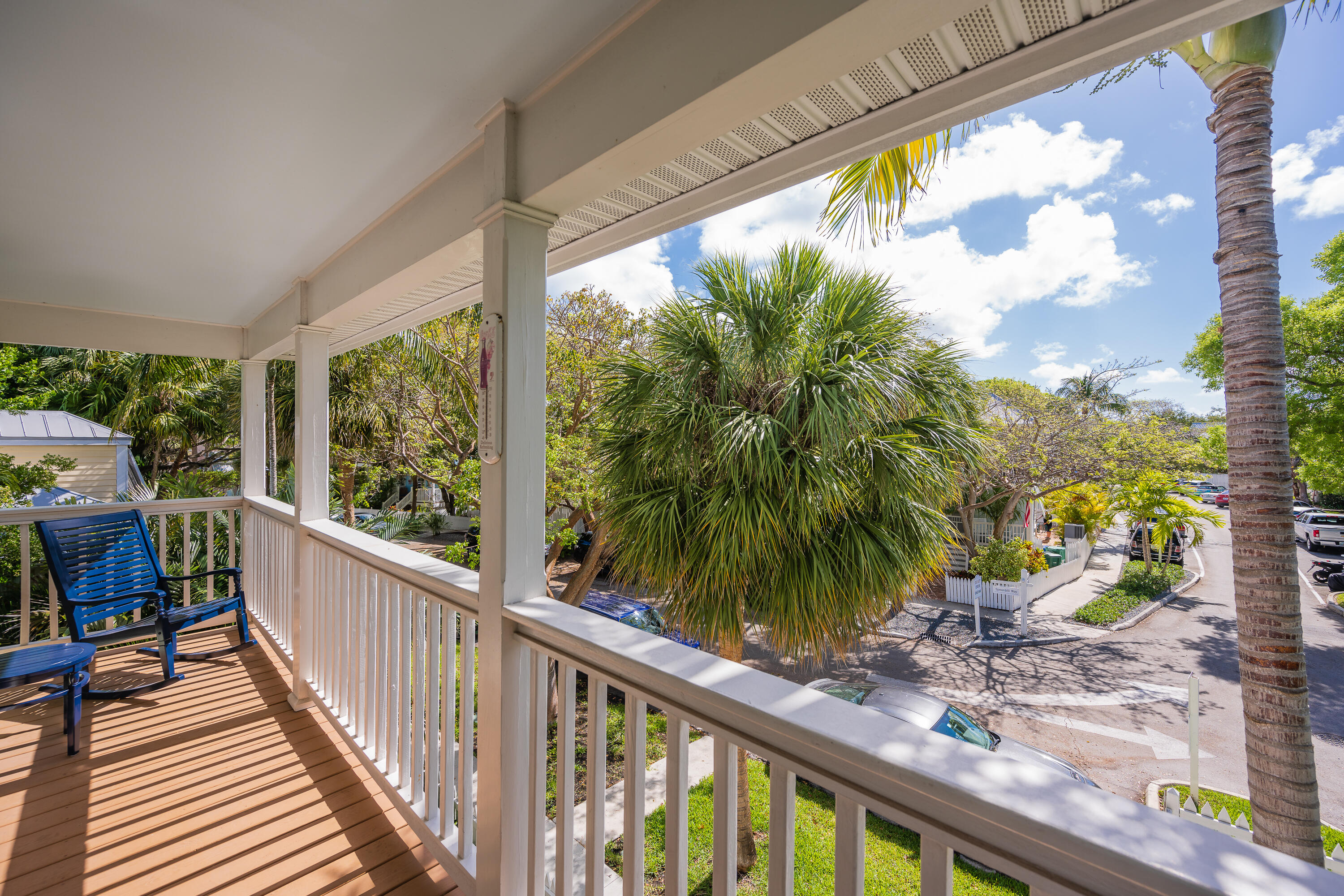 28 Spoonbill Way Key West, FL 33040 - Photo 45 of 82 a view of a porch with a table and chairs