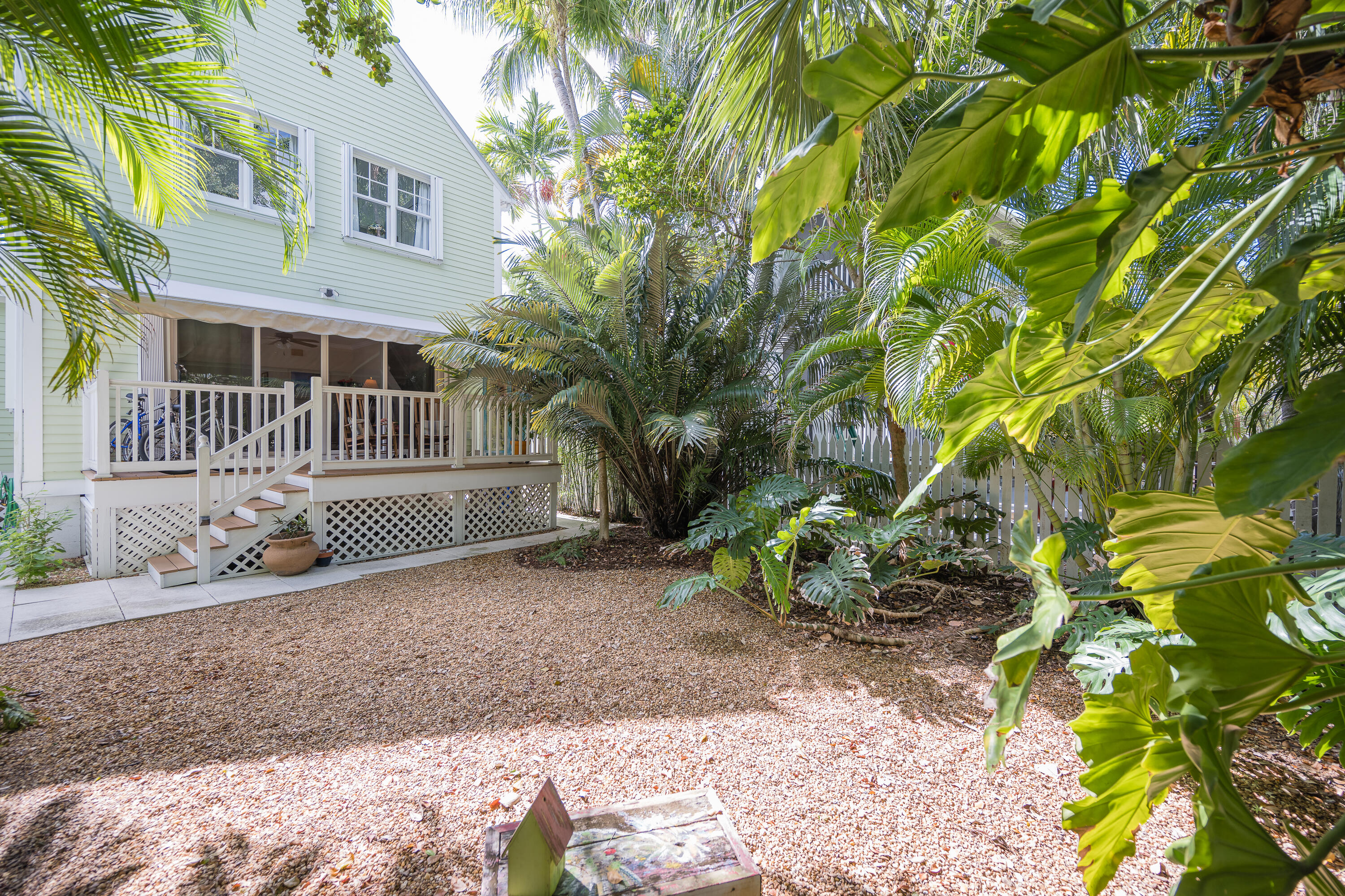 28 Spoonbill Way Key West, FL 33040 - Photo 62 of 82 a front view of a house with a yard and potted plants