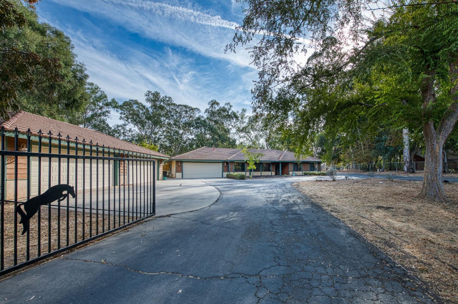 12592 Auberry Road Clovis, CA 93619 - Photo 60 of 65 a view of house and outdoor space