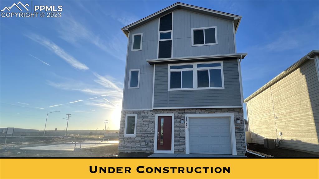 11270 Feliz Way Fountain, CO 80817 - Photo 1 of 42 a view of a house with a yard