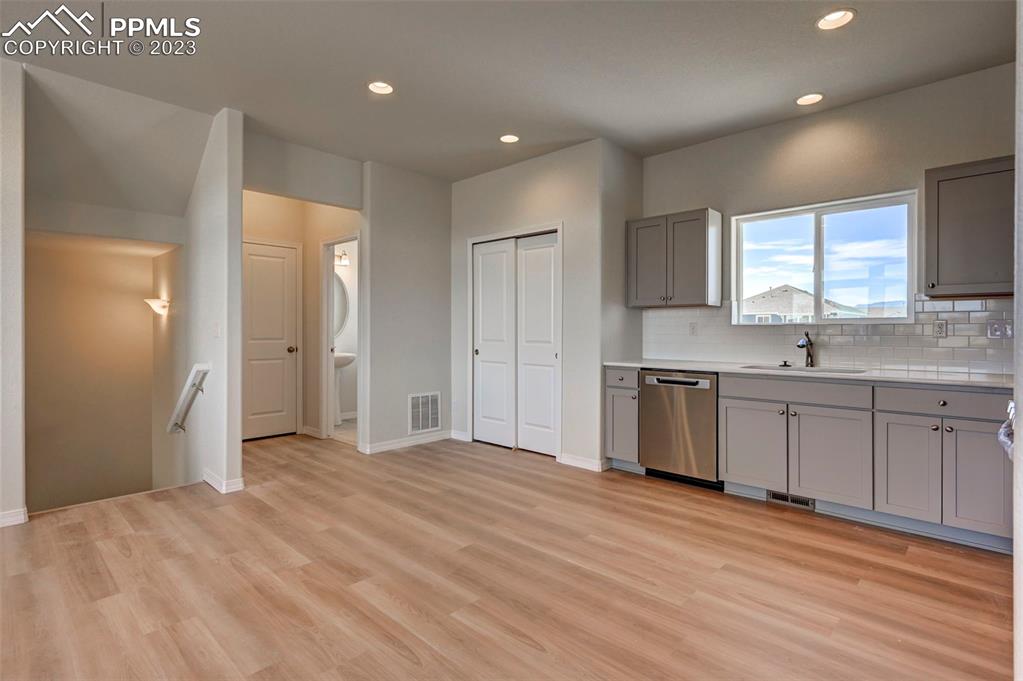 11270 Feliz Way Fountain, CO 80817 - Photo 16 of 42 a view of a kitchen with a sink a refrigerator and window