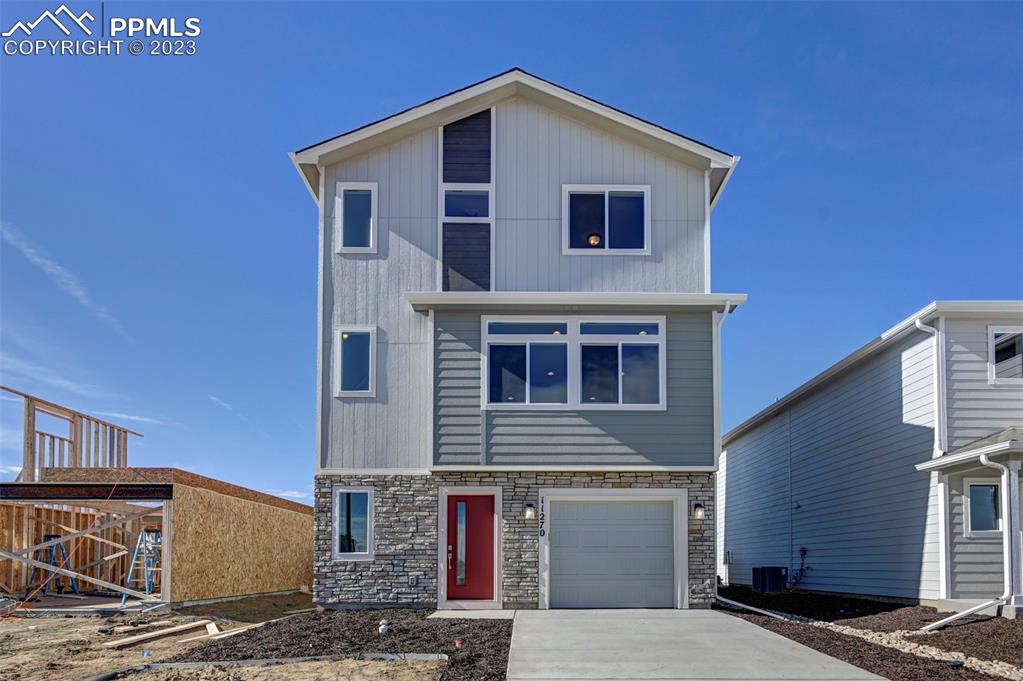 11270 Feliz Way Fountain, CO 80817 - Photo 2 of 42 a front view of a house with parking