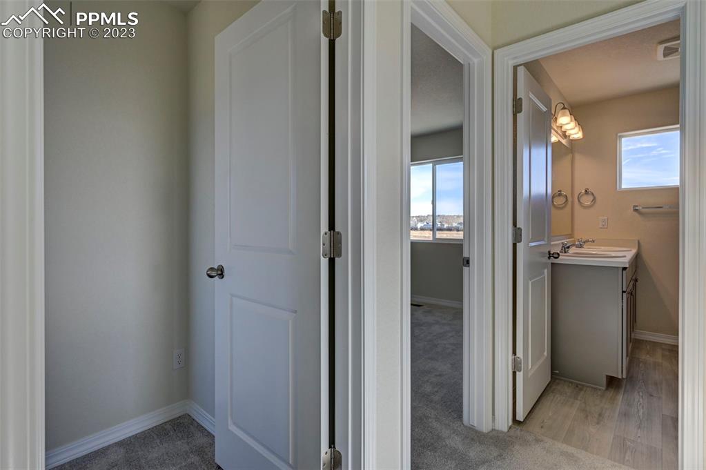 11270 Feliz Way Fountain, CO 80817 - Photo 26 of 42 a view of a bathroom from a hallway