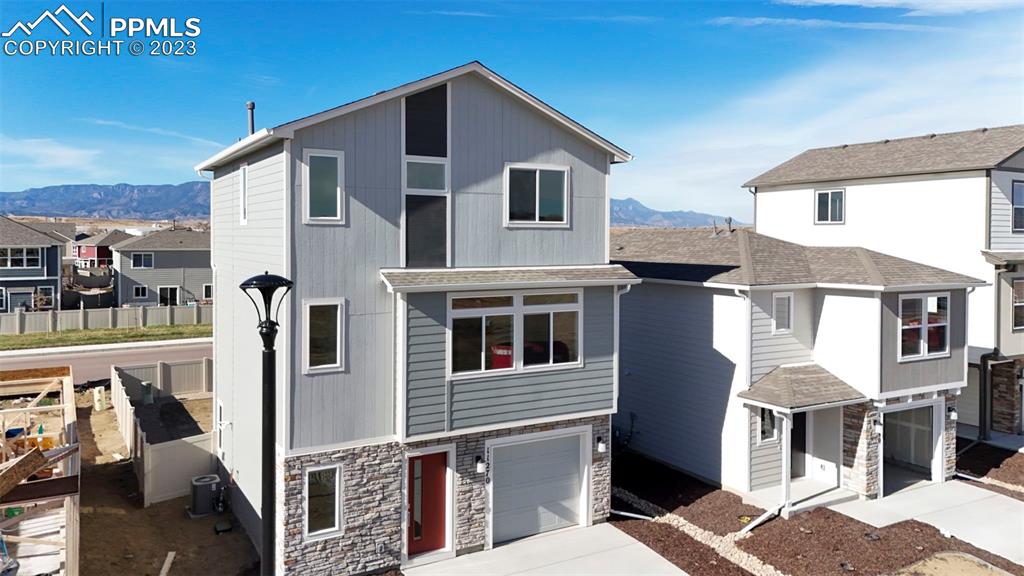 11270 Feliz Way Fountain, CO 80817 - Photo 5 of 42 a front view of a house with balcony