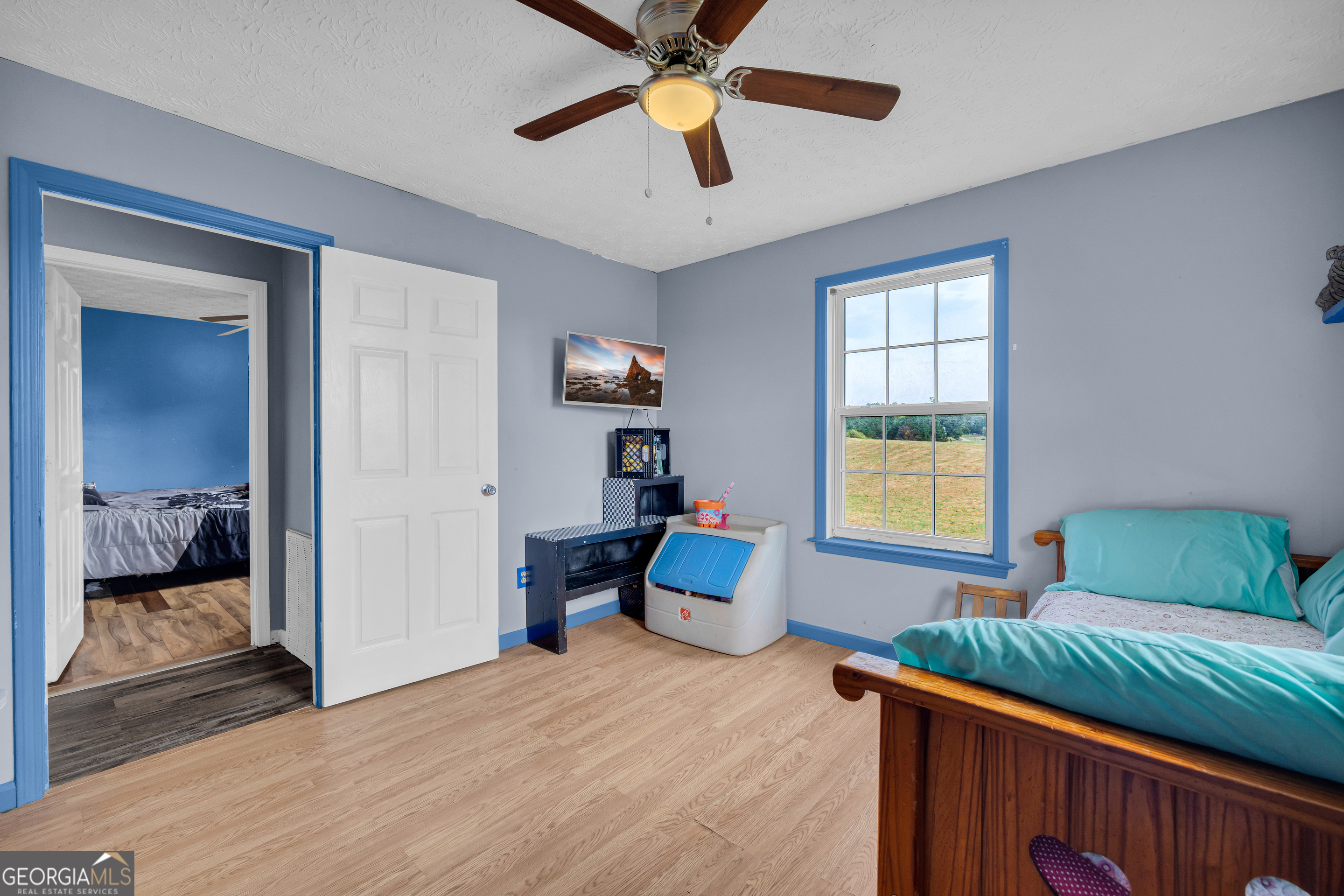 156 Shirley Road Royston, GA 30662 - Photo 17 of 29 a bedroom with a bed and a window