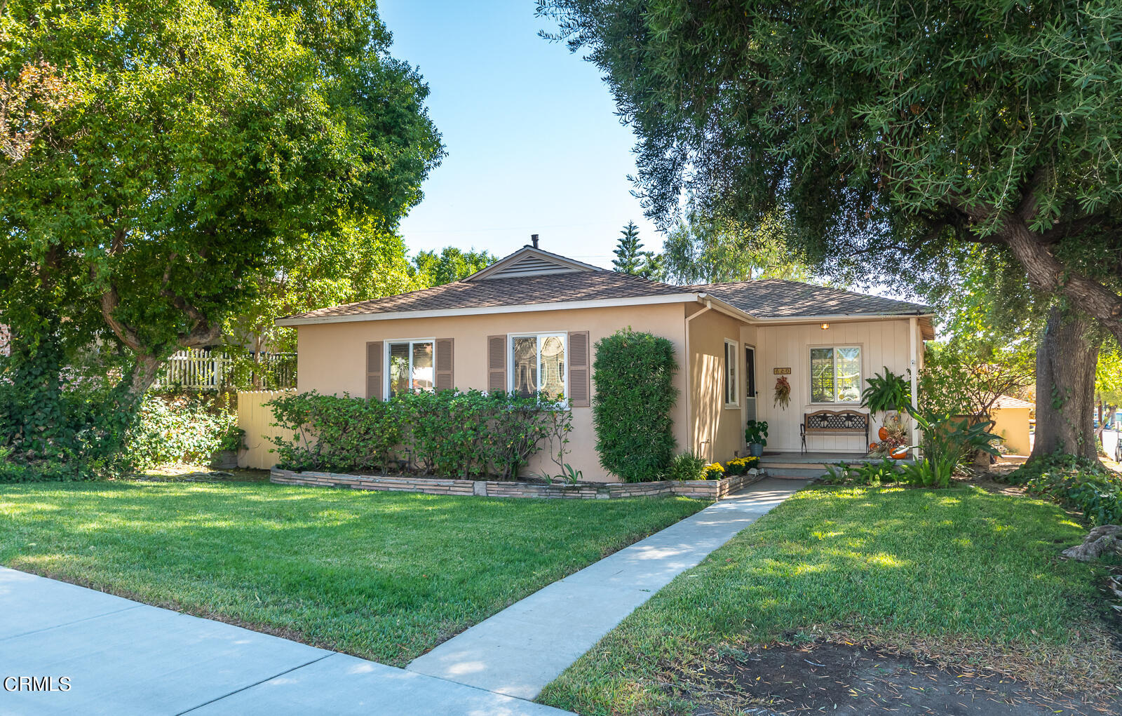620 Jamestown Road Burbank, CA 91504 - Photo 1 of 26 a front view of a house with a yard and porch