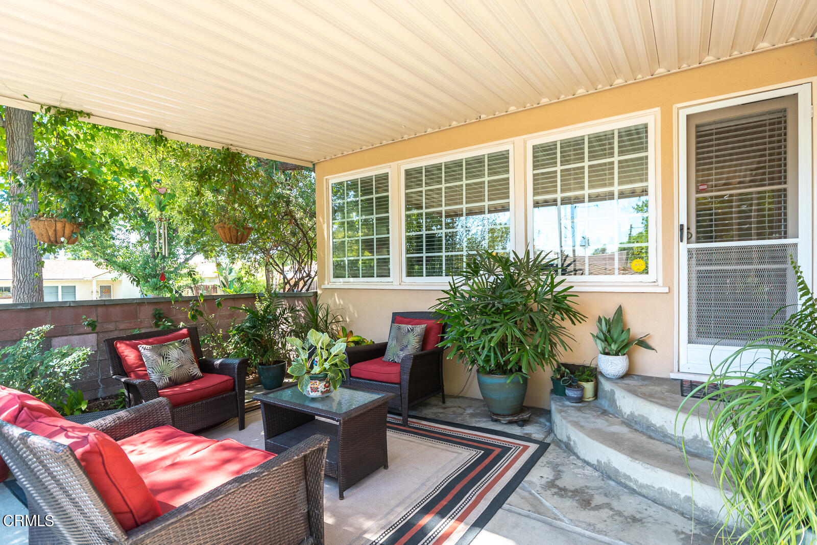 620 Jamestown Road Burbank, CA 91504 - Photo 23 of 26 a potted plant sitting in front of a house