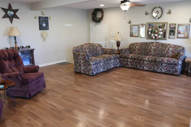 a kitchen with a sink a stove and cabinets