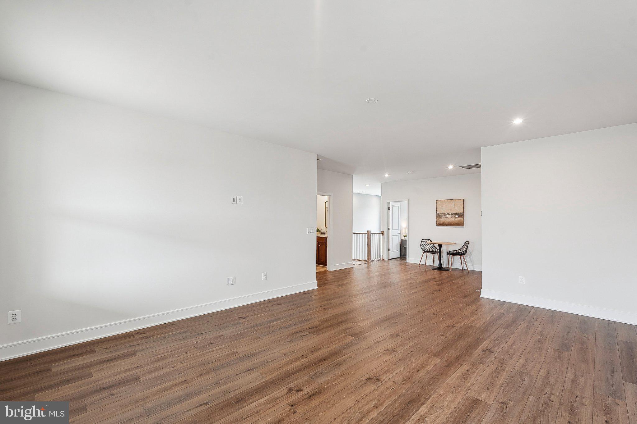 43244 Greeley Square Ashburn, VA 20148 - Photo 18 of 43 a view of empty room with wooden floor