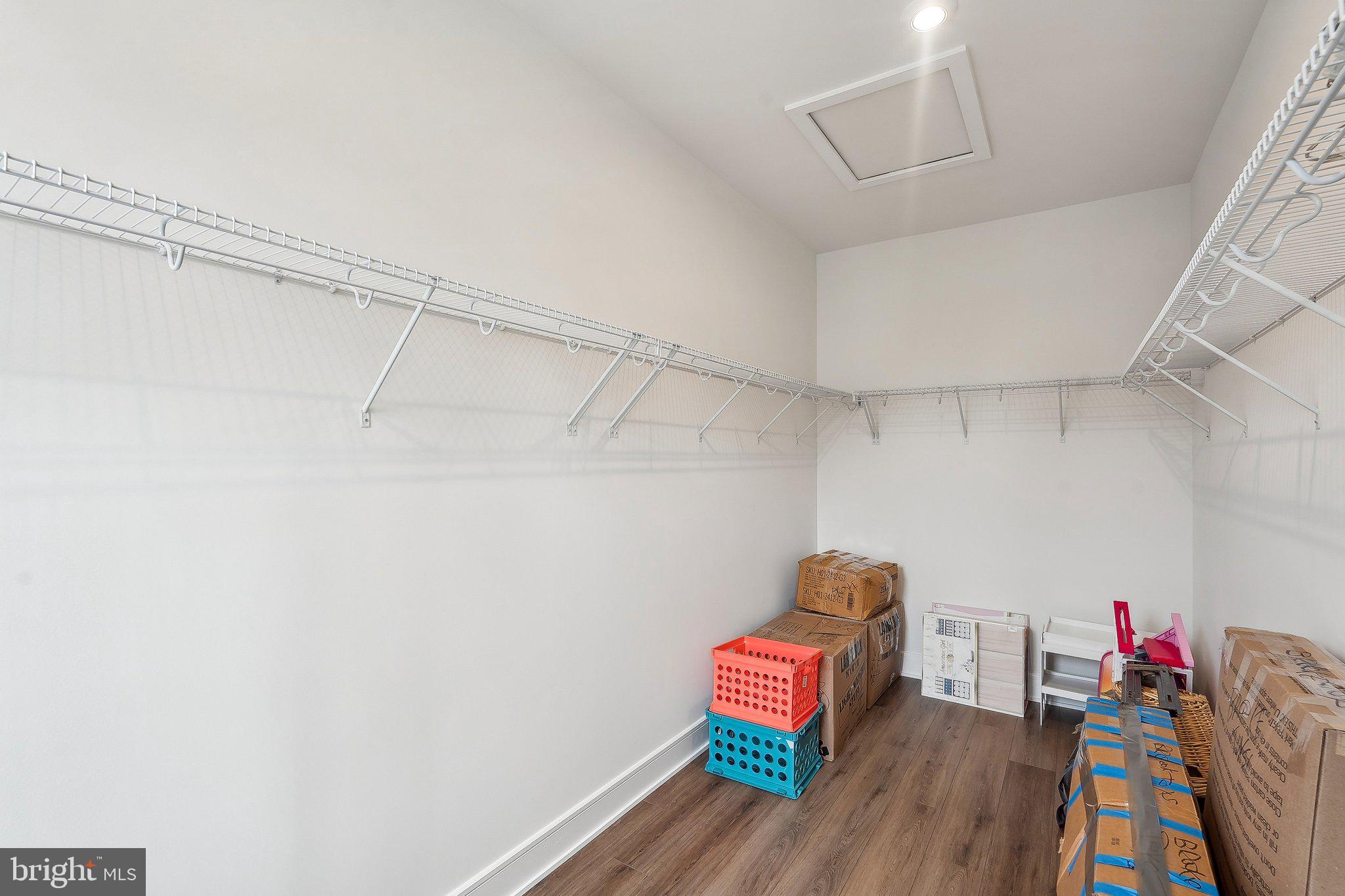 43244 Greeley Square Ashburn, VA 20148 - Photo 22 of 43 a view of room with clothes and shoes