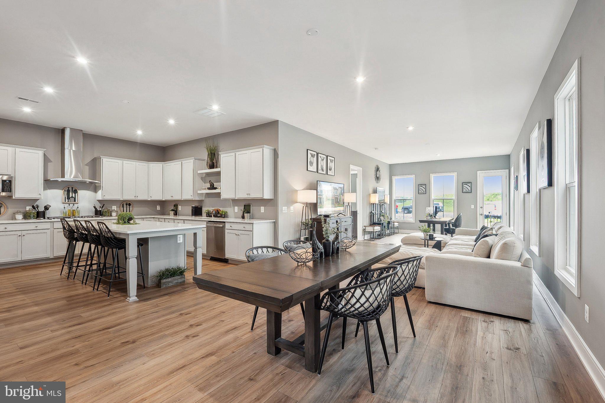 43244 Greeley Square Ashburn, VA 20148 - Photo 3 of 43 a view of a dining room with furniture kitchen and wooden floor