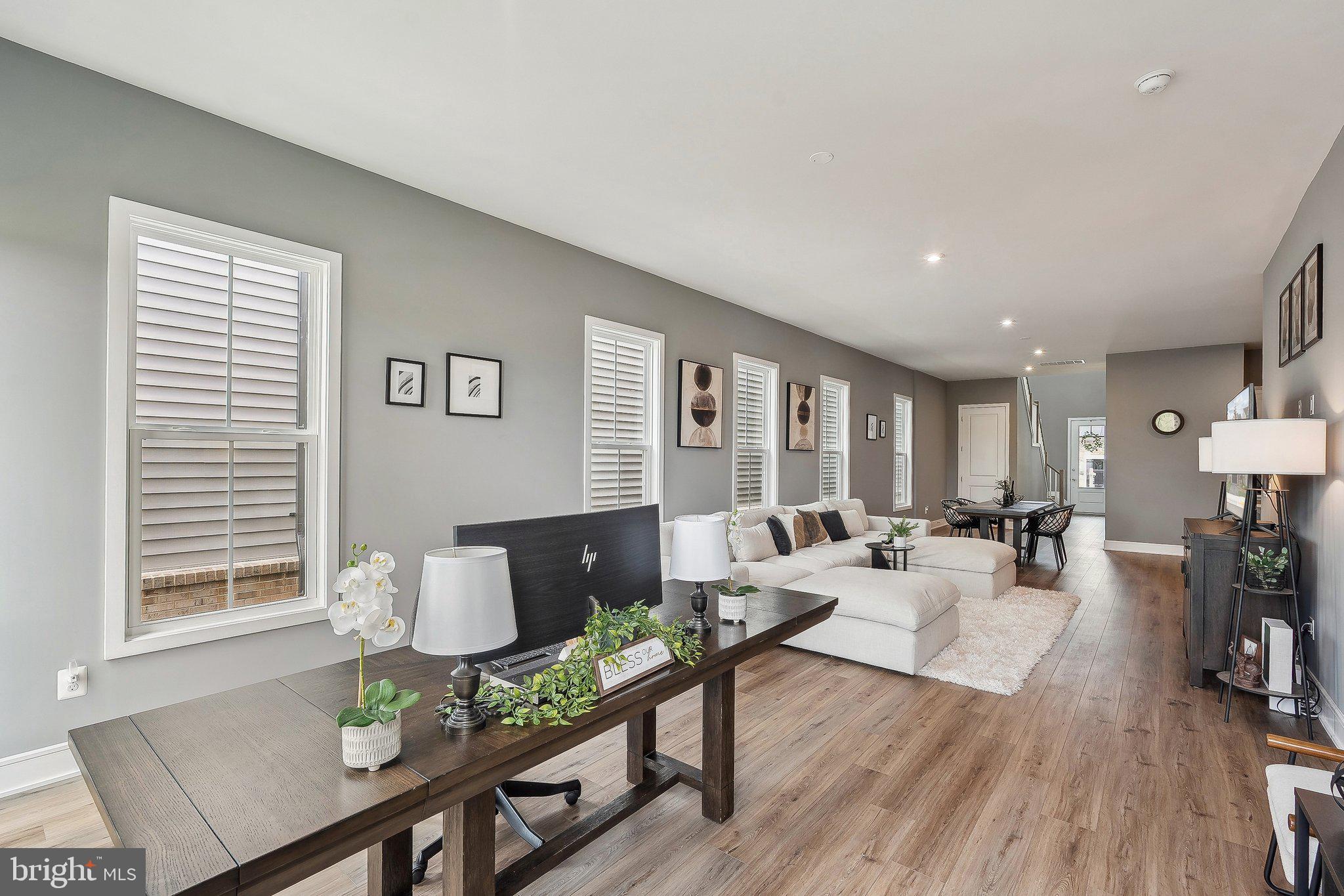 43244 Greeley Square Ashburn, VA 20148 - Photo 9 of 43 a living room with furniture and wooden floor