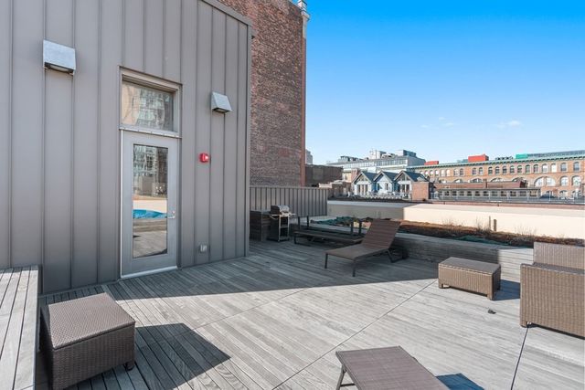 a building outdoor space with patio furniture