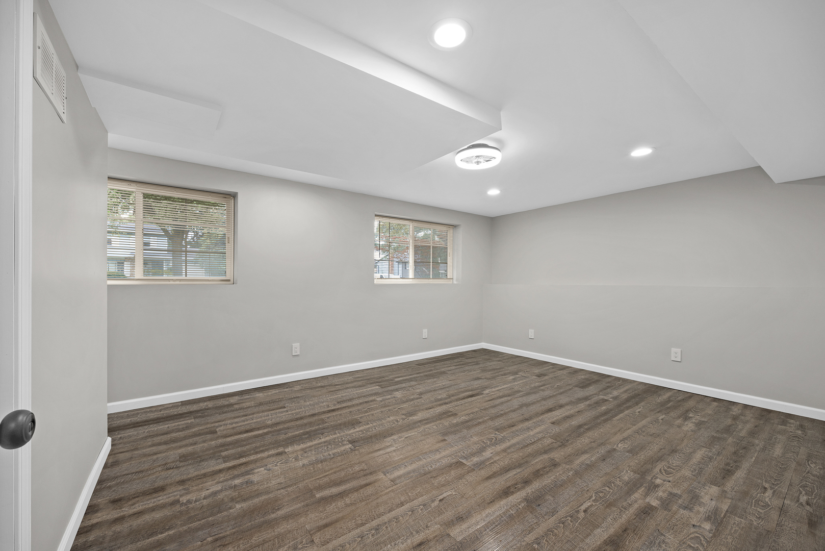 148 Bedford Road Bolingbrook, IL 60440 - Photo 23 of 32 a view of an empty room with wooden floor and a window