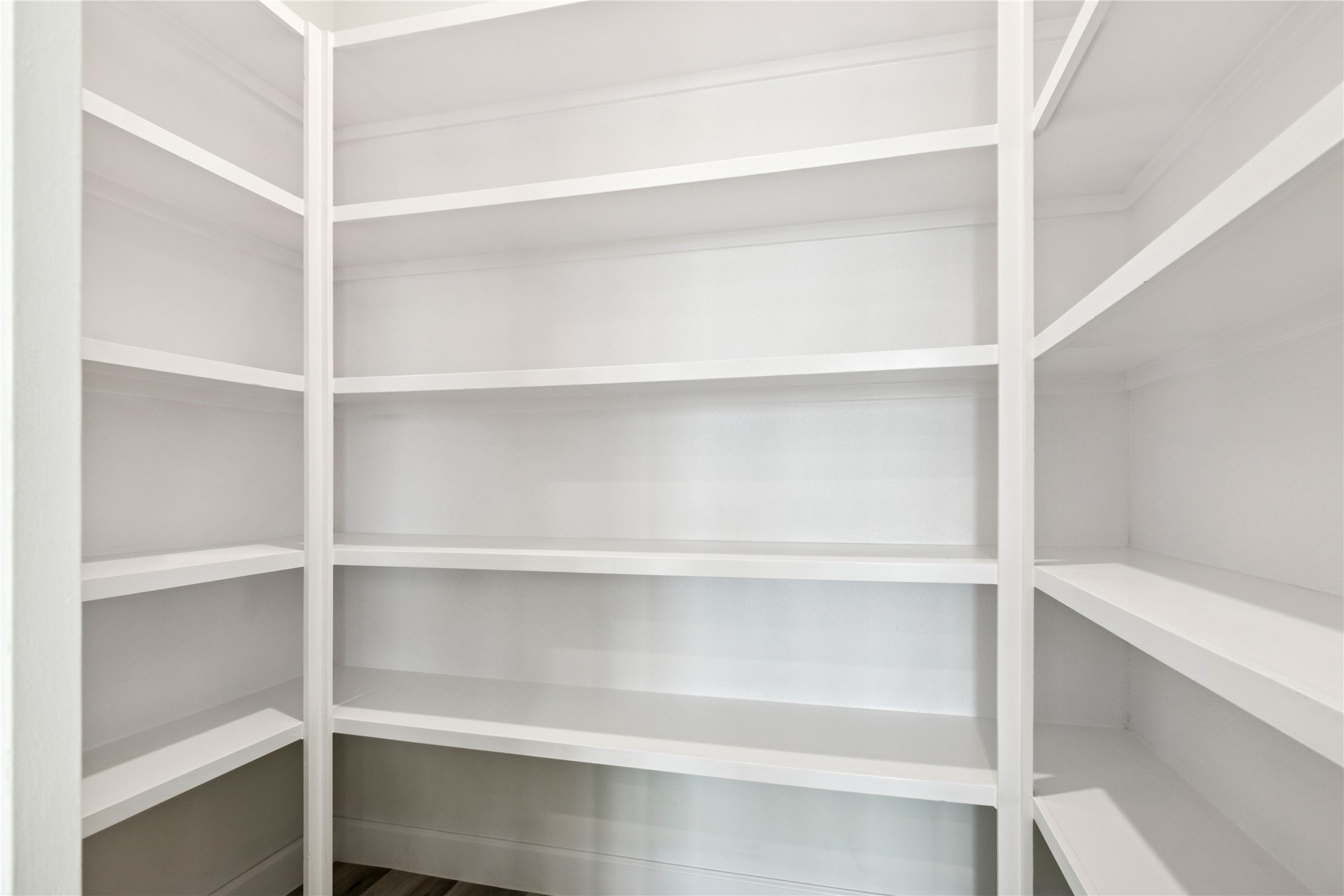 5766 Ward Bend Road Sealy, TX 77474 - Photo 18 of 45 a view of walk in closet with empty racks