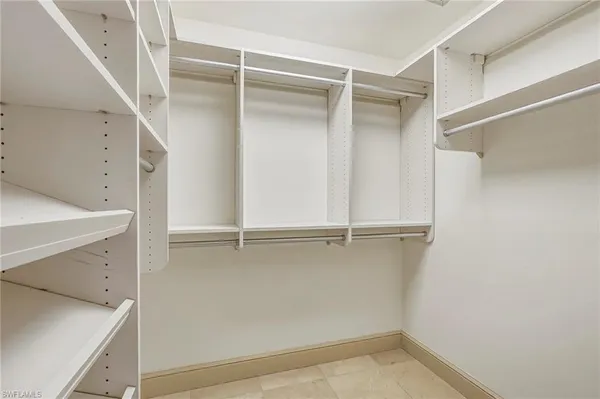 a view of an empty walk in closet