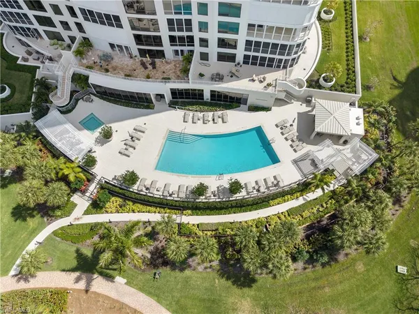 a view of swimming pool with seating