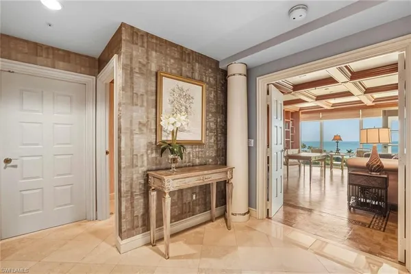 a kitchen with stainless steel appliances granite countertop a stove and a refrigerator