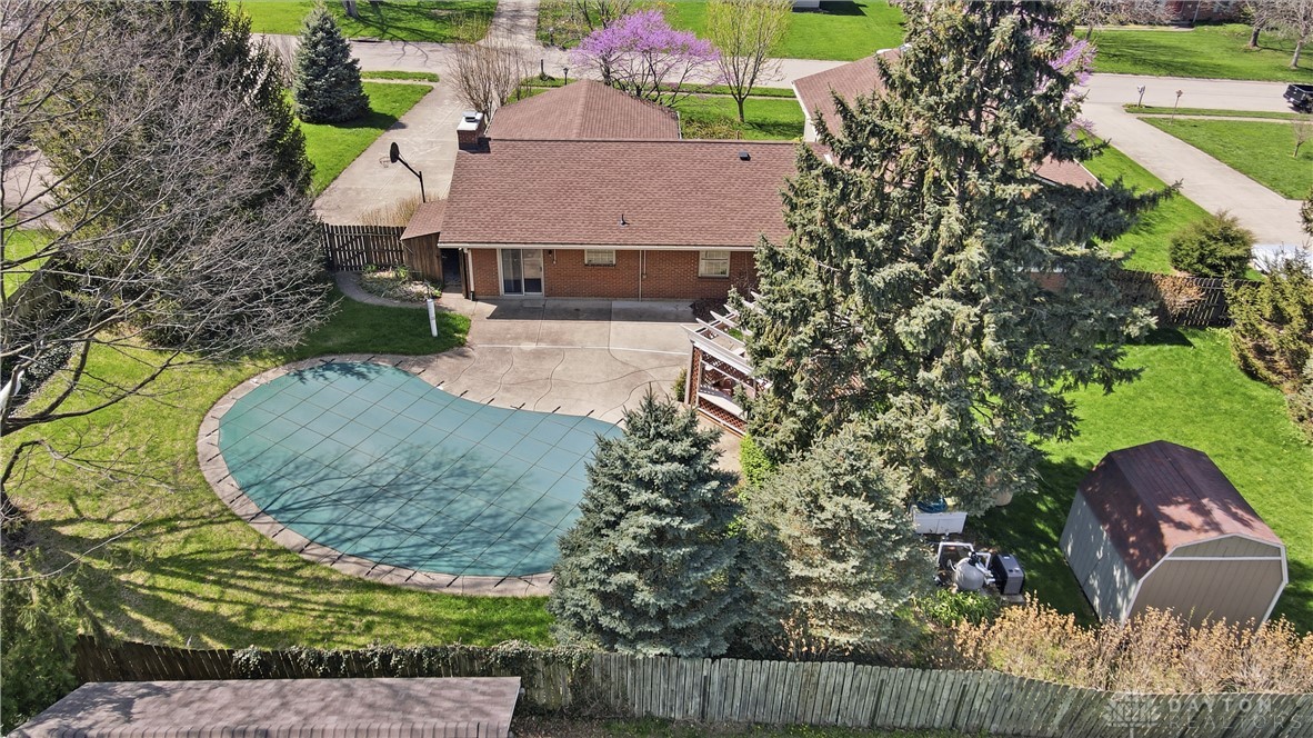 9964 Hummingbird Way Dayton, OH 45458 - Photo 3 of 57 This private retreat offers a sparkling pool and a generous yard for outdoor enjoyment.