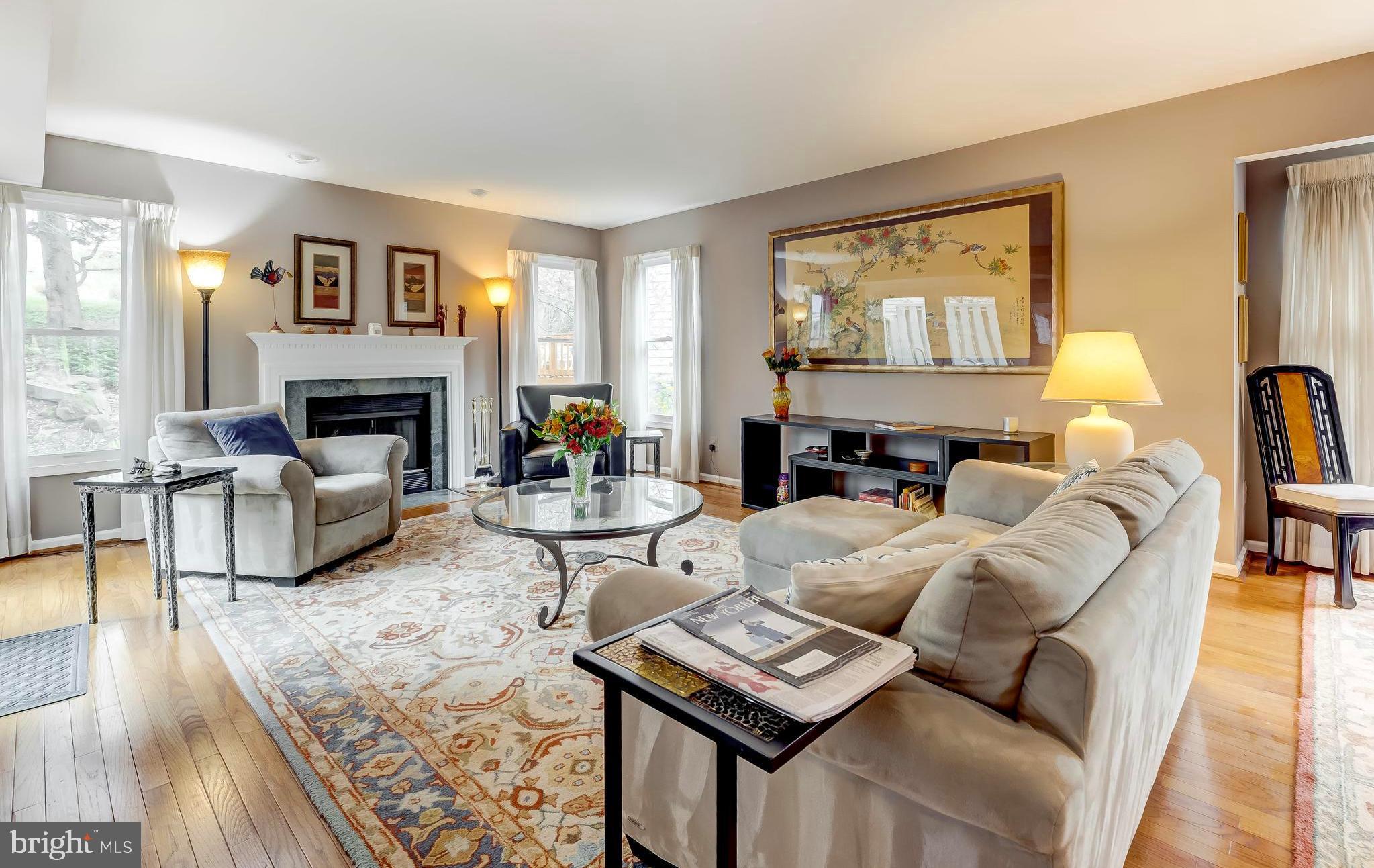 5854 Pimlico Road Baltimore, MD 21209 - Photo 1 of 48 Expansive living room with wood fireplace