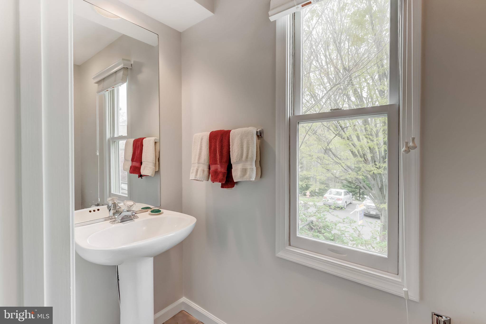 5854 Pimlico Road Baltimore, MD 21209 - Photo 19 of 48 Convenient powder room on main level