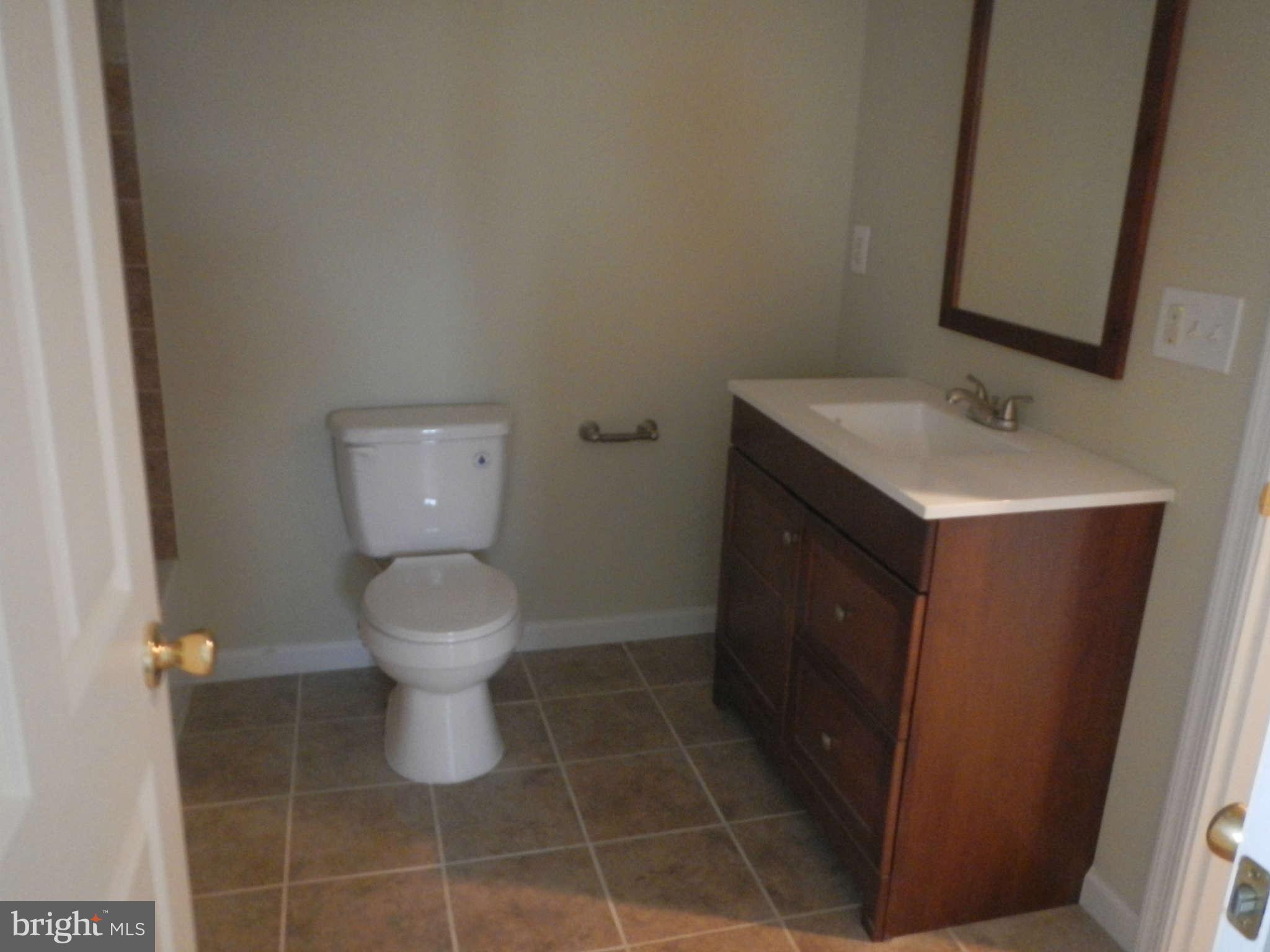 16601 Livingston Road Accokeek, MD 20607 - Photo 15 of 18 Basement bath