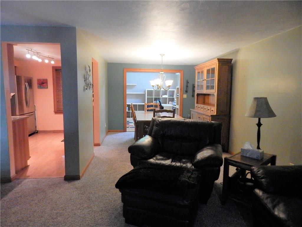 439 Tivoli Road Pittsburgh, PA 15239 - Photo 4 of 23 LIVING ROOM LOOKING INTO THE KITCHEN.