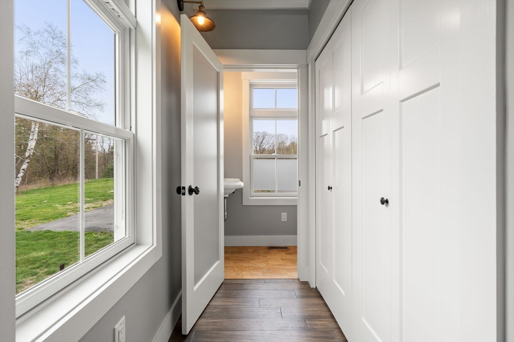 29 Heywood Road Ashby, MA 01431 - Photo 14 of 33 a view of a bathroom with a glass door