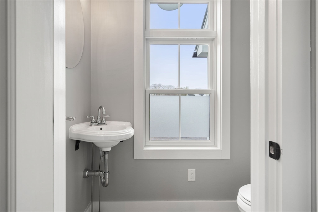 29 Heywood Road Ashby, MA 01431 - Photo 15 of 33 a bathroom with a sink a toilet and shower